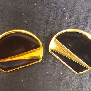 Monet Black enamel gold tone disc clip on earrings